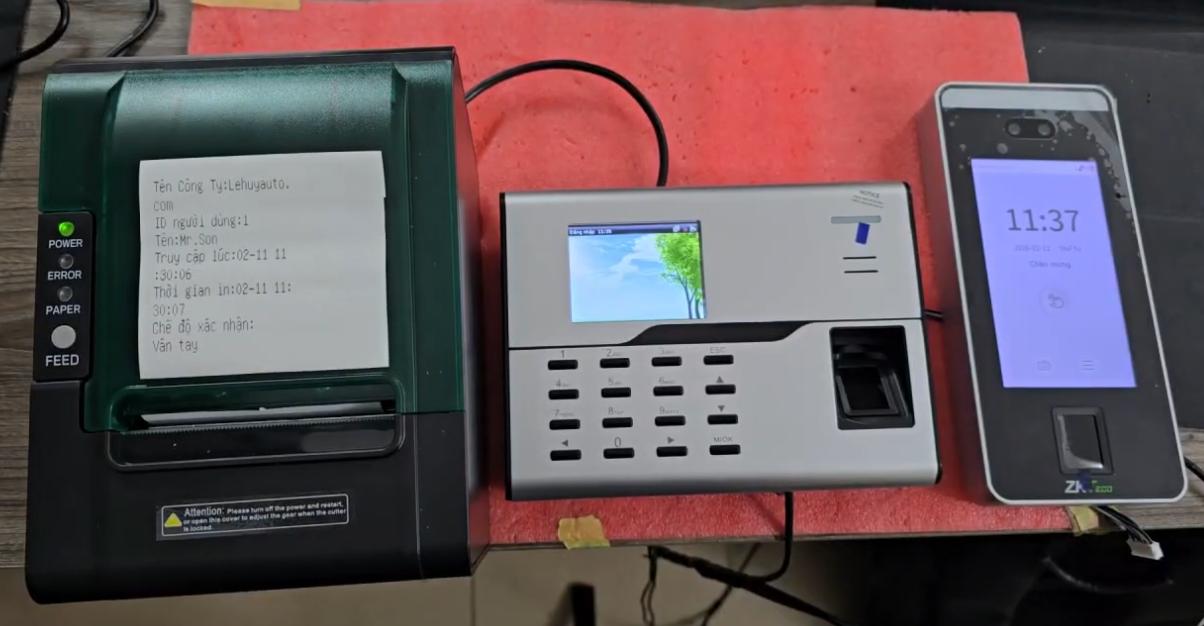 Máy chấm công khuôn mặt , vân tay kết nối với máy in bill in phiếu chấm cơm